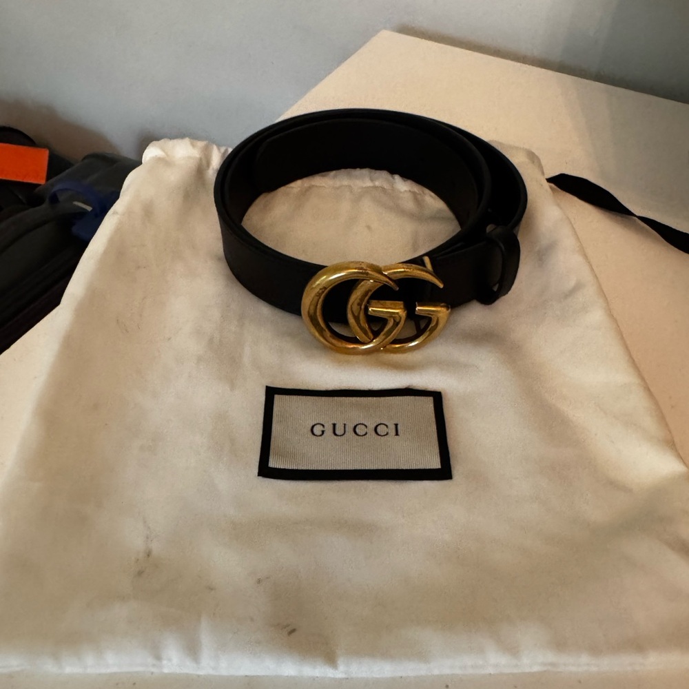 Gucci Black and Gold Leather Belt with Iconic GG Buckle